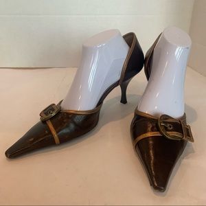 BCBG heels size 10 Brown with open sides accented with copper trim and buckle